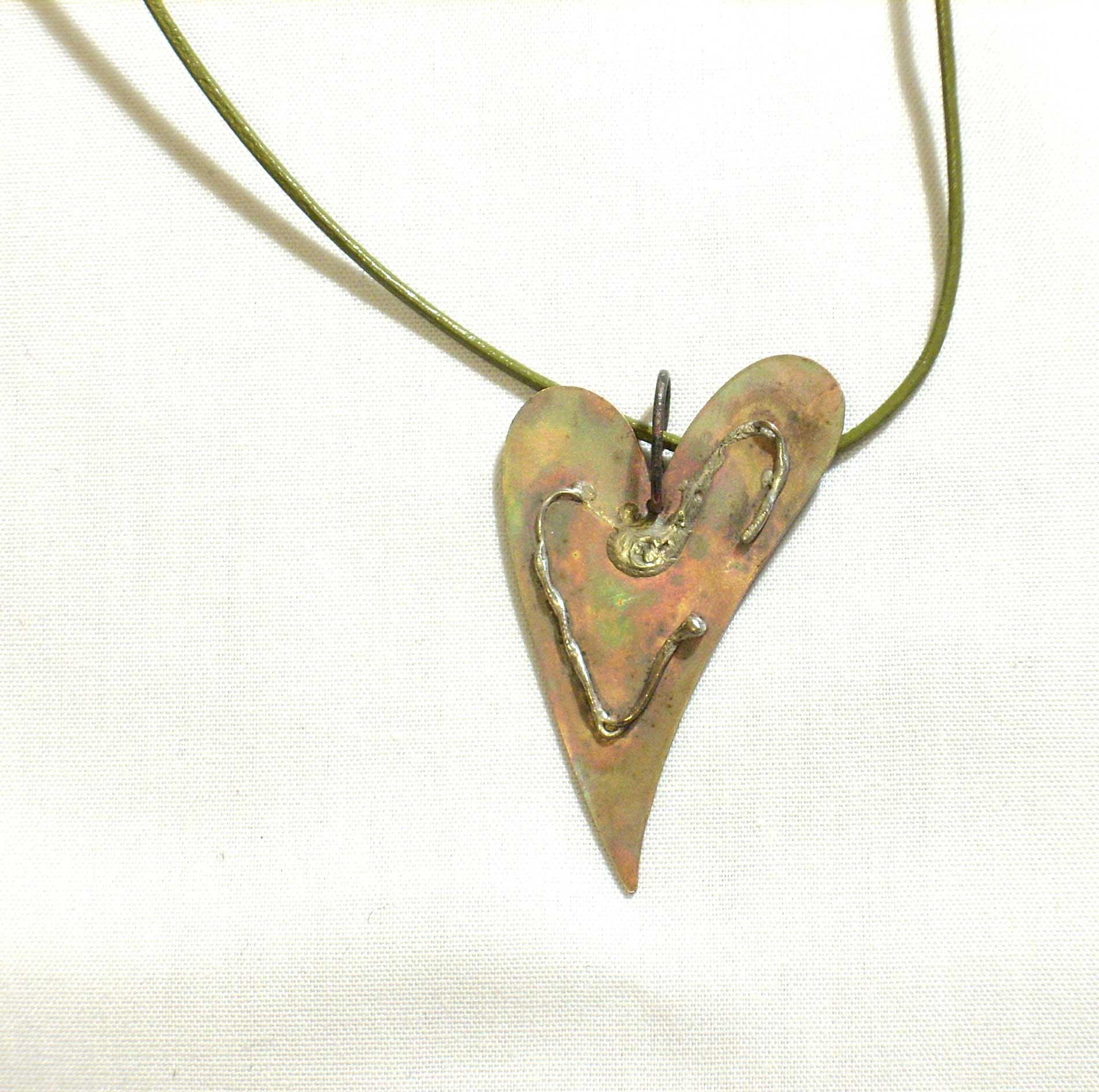 Brass heart with fused silver wire
